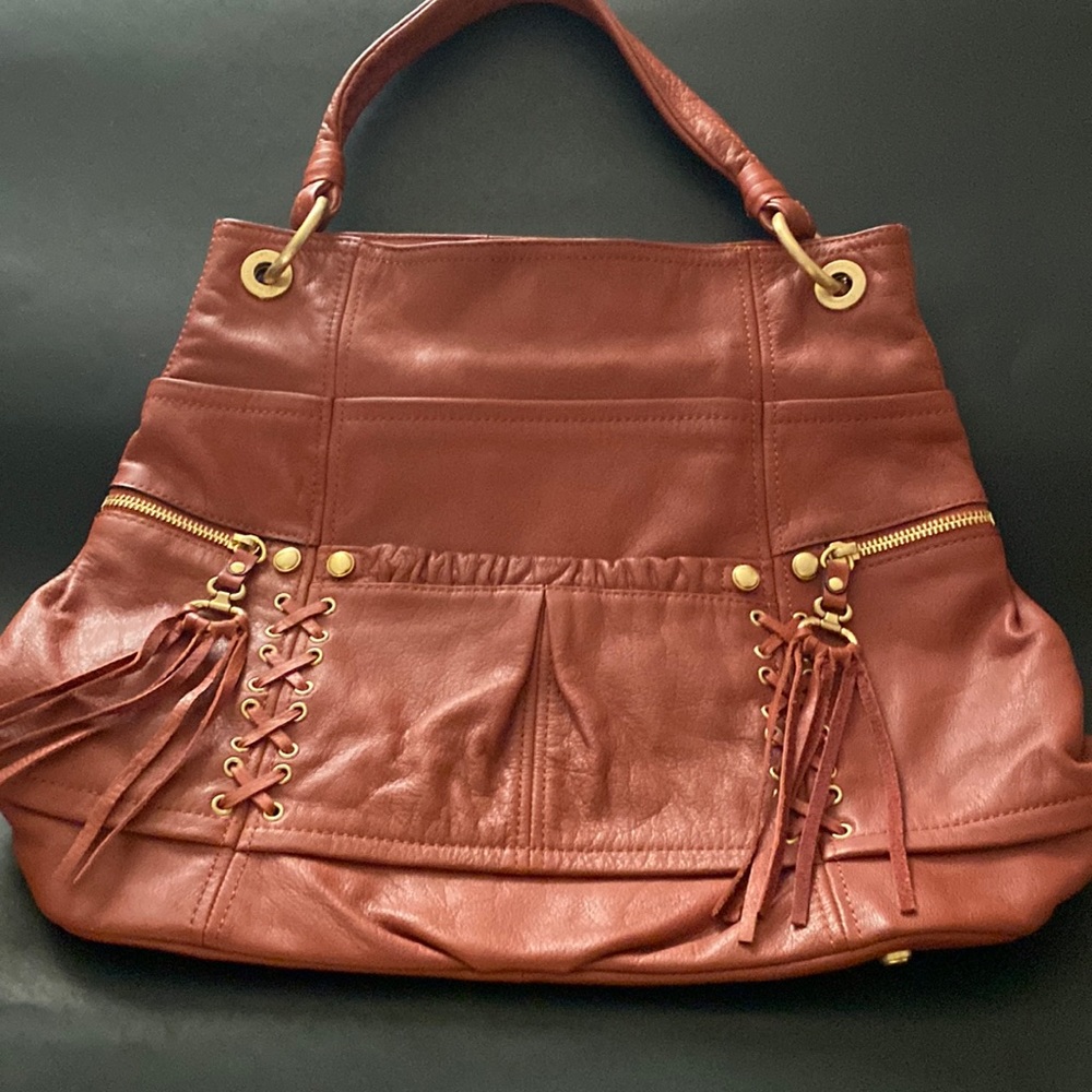 B Makowsky rust colored purse with leopard liner